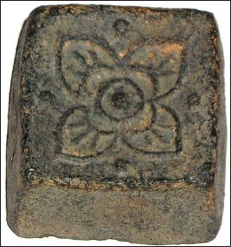 Picture59+15th+century+Tin+ingot+decorated+with+lotus+petal+discovered+in+Malacca.jpg