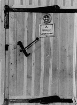 A door to a gas chamber in Auschwitz.jpg