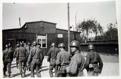 american-soldiers-enter-barrack-see-exhibits.jpg