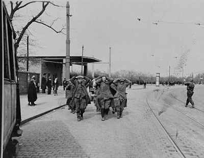 former-ss-guards-buchenwald-who-have-been-captured-american-troops-march-along-street.jpg