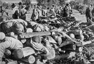 Klooga Concentration Camp Massacre in Estonia, September 19, 1944 - Corpses of inmates from Klooga concentration camp stacked for burning