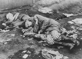 A camp survivor, soon after liberation. Bergen-Belsen, Germany, after April 12, 1945.jpg