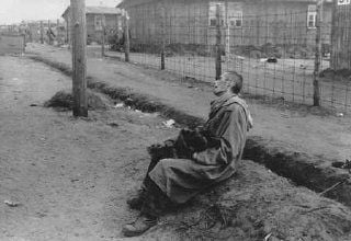 An inmate of the Bergen-Belsen camp, after liberation.jpg