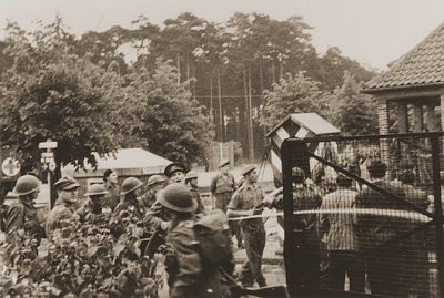 british-soldiers-guard-entrance-bergen-belsen-displaced-persons-camp.jpg
