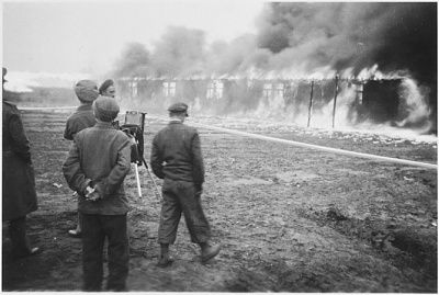 british-soldiers-watch-fire-consumes-barracks-bergen-belsen-concentration-camp.jpg