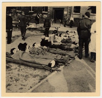 infirmed-survivors-bergen-belsen-lie-row-stretchers-while-they-wait-attended-.jpg