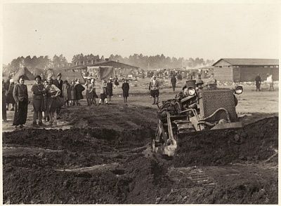 survivors-stand-watch-tractor-digs-mass-grave-bergen-belsen-concentration-camp.jpg