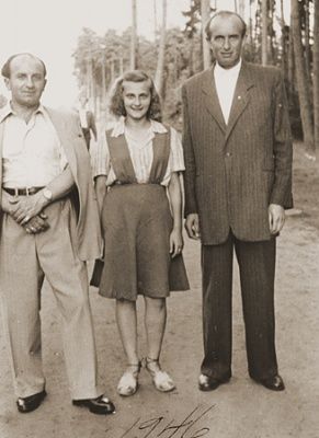 three-jewish-dps-pose-outside-bergen-belsen-displaced-persons-camp.jpg