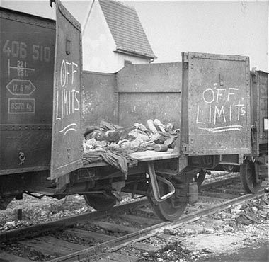 Corpses lie in one of the open railcars of the Dachau death train18.jpg