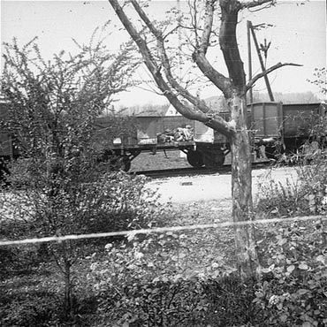 View of the open railcars of the Dachau death train.jpg