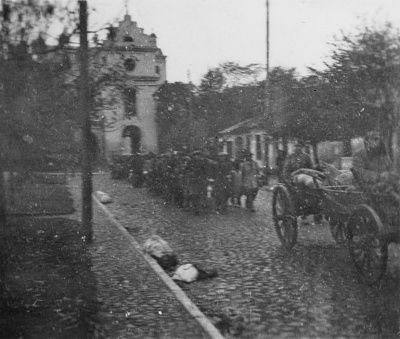 column-jews-walks-behind-wagon-cobblestone-street-during-deportation-action-.jpg