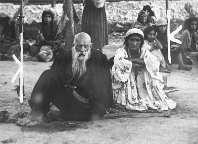 close-up-gypsy-couple-sitting-open-area-belzec-concentration-camp.jpg