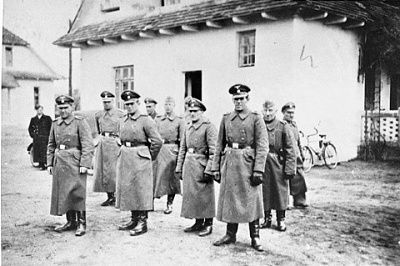 ss-guards-stand-formation-outside-commandants-house-near-belzec-concentration-camp.jpg