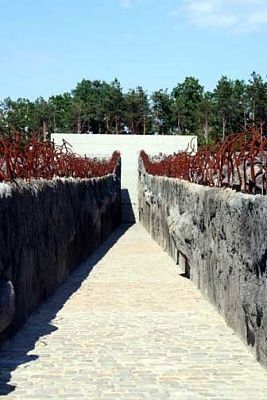 path-cut-through-burial-site-former-camp.jpg