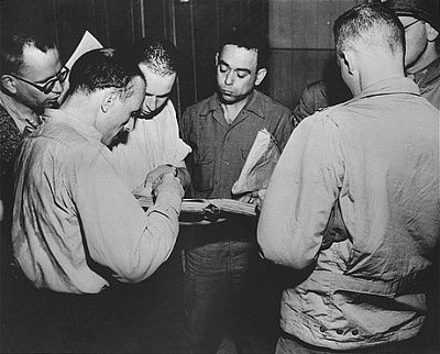 lawyer-staff-judge-advocate-general-3rd-u.s.-army-checks-books-listing-extermi.jpg