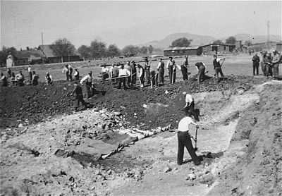 austrian-civilians-prepare-mass-graves-bury-bodies-former-concentration-camp-inmates-.jpg