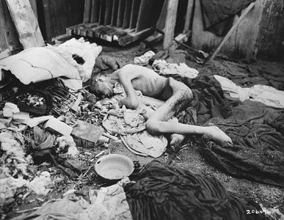 emaciated-body-former-inmate-gusen-concentration-camp-lies-outside-barracks-am.jpg