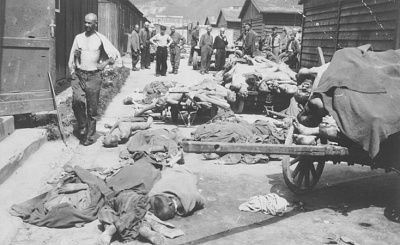 survivors-view-corpses-have-been-piled-up-carts-ground-prior-their-burial.jpg