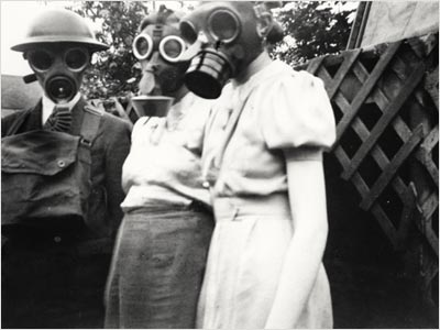 Gas Masks and Gas Warfare From World War I Through the 1940s - A family wearing their gas masks, Birmingham, c 1940