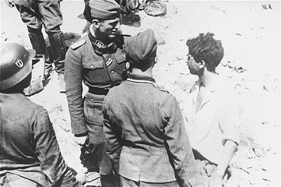 ss-lieutenant-untersturmfuehrer-interrogates-jewish-resistance-fighter-captured-tw.jpg