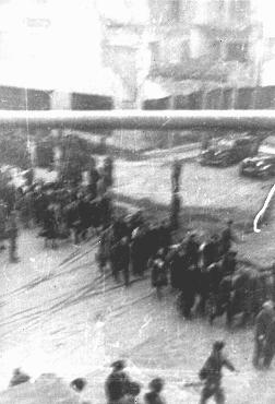 Deportation of Jews from the Warsaw ghetto during the uprising. This photo was taken secretly.jpg