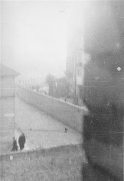 German personnel near the ghetto wall on Okopowa Street.jpg