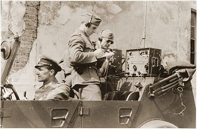 german-policemen-operate-radio-command-car-during-suppression-warsaw-ghetto-upris.jpg