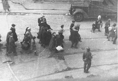 jews-captured-ss-march-past-st.-zofia-hospital-down-nowolipie-street-towards-umsc.jpg