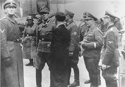 ss-major-general-juergen-stroop-second-left-gathers-information-civilian-se.jpg