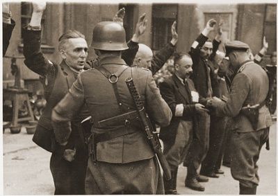 ss-troops-officers-search-jewish-department-heads-brauer-armaments-factory.jpg