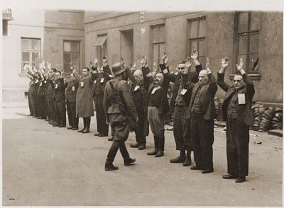 ss-troops-arrest-jewish-department-heads-brauer-armament-factory.jpg
