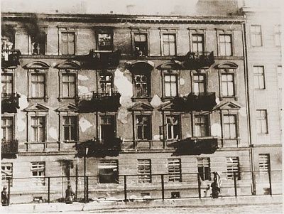 ss-troops-stand-near-bodies-jews-who-committed-suicide-jumping-fourth-storey-wi.jpg