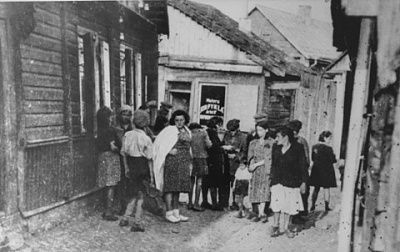group-jewish-women-converse-alley-outside-only-barbershop-kovno-ghetto.jpg