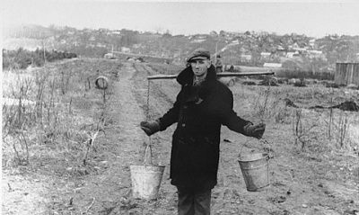 jew-wearing-yoke-across-his-shoulders-carries-two-pails-water-agricultural-plot-.jpg