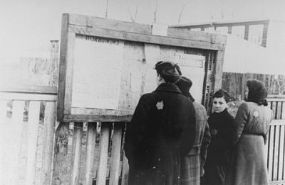 small-group-jews-reads-announcements-posted-jewish-council-display-box-.jpg