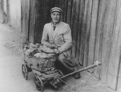 impoverished-ghetto-resident-sells-bread-black-market.jpg