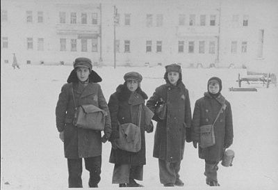 four-school-boys-pose-snowy-street-kovno-ghetto-their-school-bags.jpg