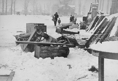 household-furnishings-left-outside-street-kovno-ghetto-covered-snow.jpg