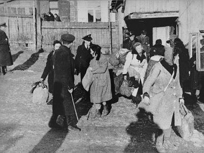 jewish-police-direct-people-assembly-area-kovno-ghetto-during-deportation-action.jpg