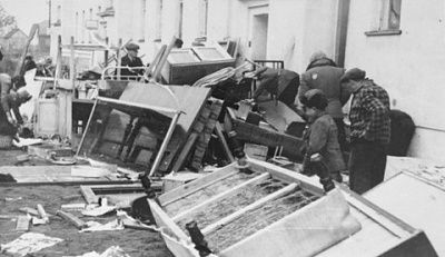 jews-scavenge-through-abandoned-property-front-block-apartments-kovno-ghetto.jpg