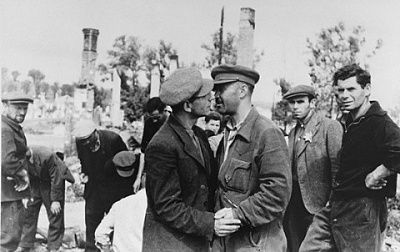 kovno-ghetto-survivors-greet-one-another-amid-ruins-ghetto.jpg