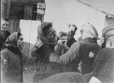 two-women-bid-each-other-farewell-assembly-point-kovno-ghetto-during-deportation-.jpg