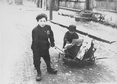two-young-boys-pull-push-wagon-kovno-ghetto.jpg