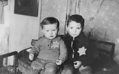 two-young-brothers-seated-family-photograph-kovno-ghetto.-one-month-later-they-we.jpg