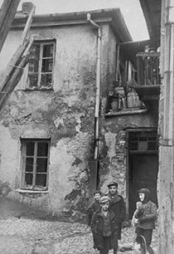 Jewish children play in a courtyard in Krakow.jpg