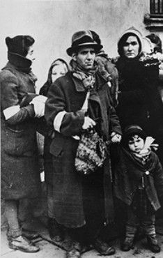 Jews gathered at an assembly point await deportation.jpg