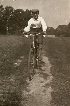 A Jewish boy rides a bicycle in the Kolbuszowa ghetto.jpg