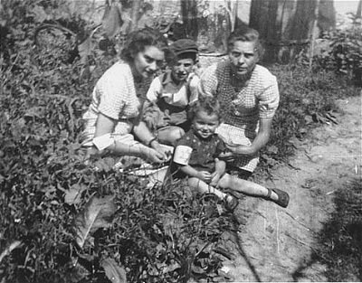 members-salesch-tz-family-sit-grass-kolbuszowa-ghetto.jpg