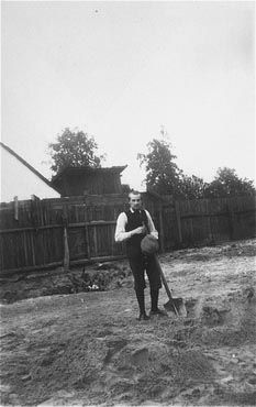 Moiszele Horowitz at forced labor preparing graves for fellow Jews who were shot by the Germans.jpg