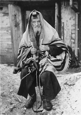 Kolbuszowa and Rzeszów Jewish Life and Ghetto Photos, 1929-1941 - The Kolbuszowa rebbe, Yechiel Teitelbaum, is forced to pose for a photograph in his tallit and t